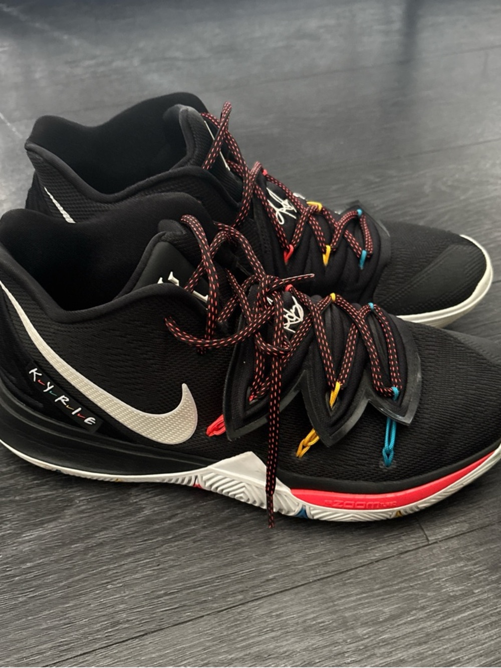 Nike Black Basketball Shoes with White Swoosh and Red/Blue Accents